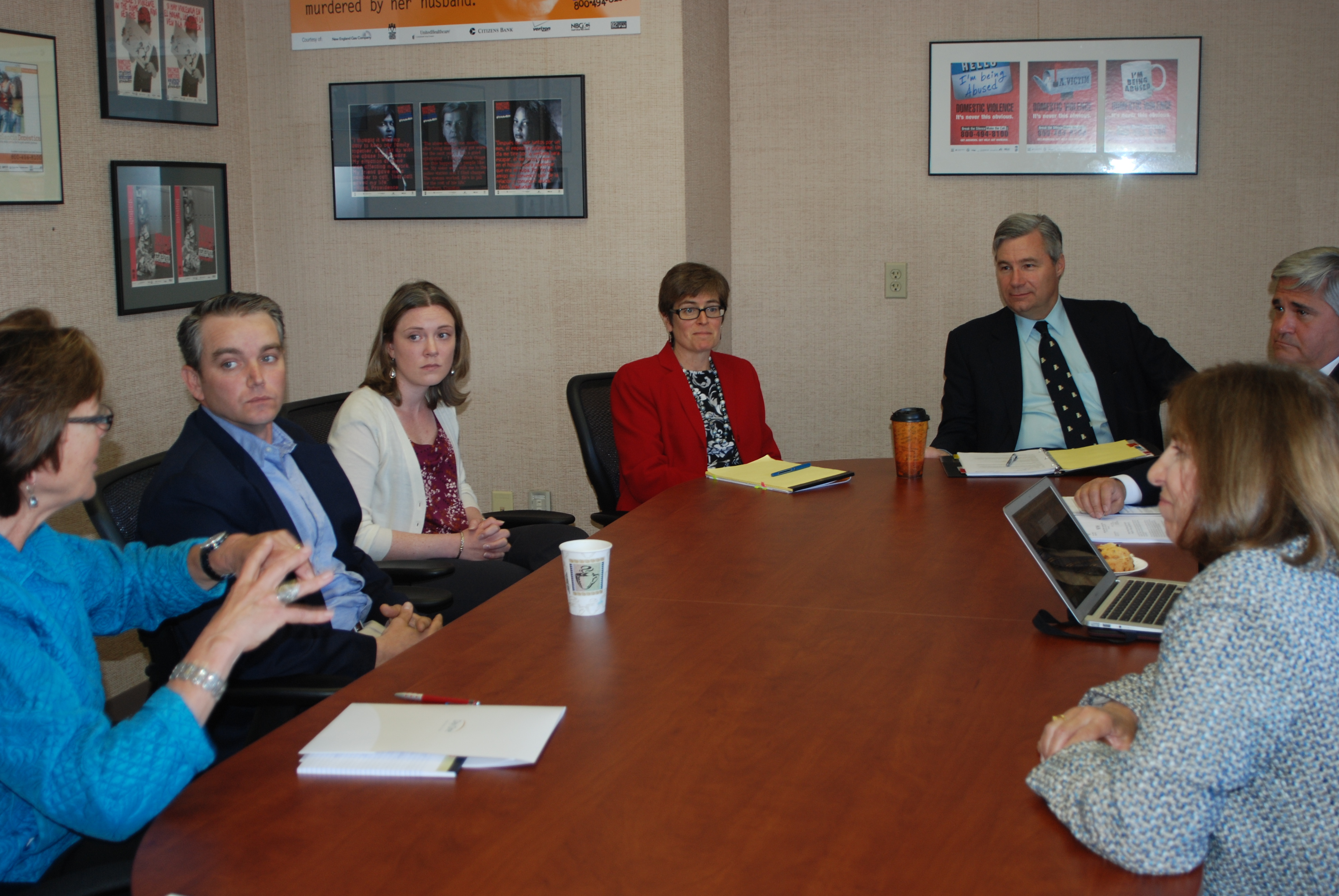 Senator Whitehouse hears from Rhode Island supporters of the Violence Against Women Act.  Pictured, from left, are Peg Langhammer, Executive Director of Day One; Mike Martin, Chief Professional Officer at the Katie Brown Educational Project; Claire Spaulding McVicker, Program Director at the Katie Brown Educational Program; Deb DeBare, Executive Director of the Rhode Island Coalition Against Domestic Violence; Senator Whitehouse; Attorney General Kilmartin; and Ann Burke, President of the Lindsay Ann Burke Memorial Fund.