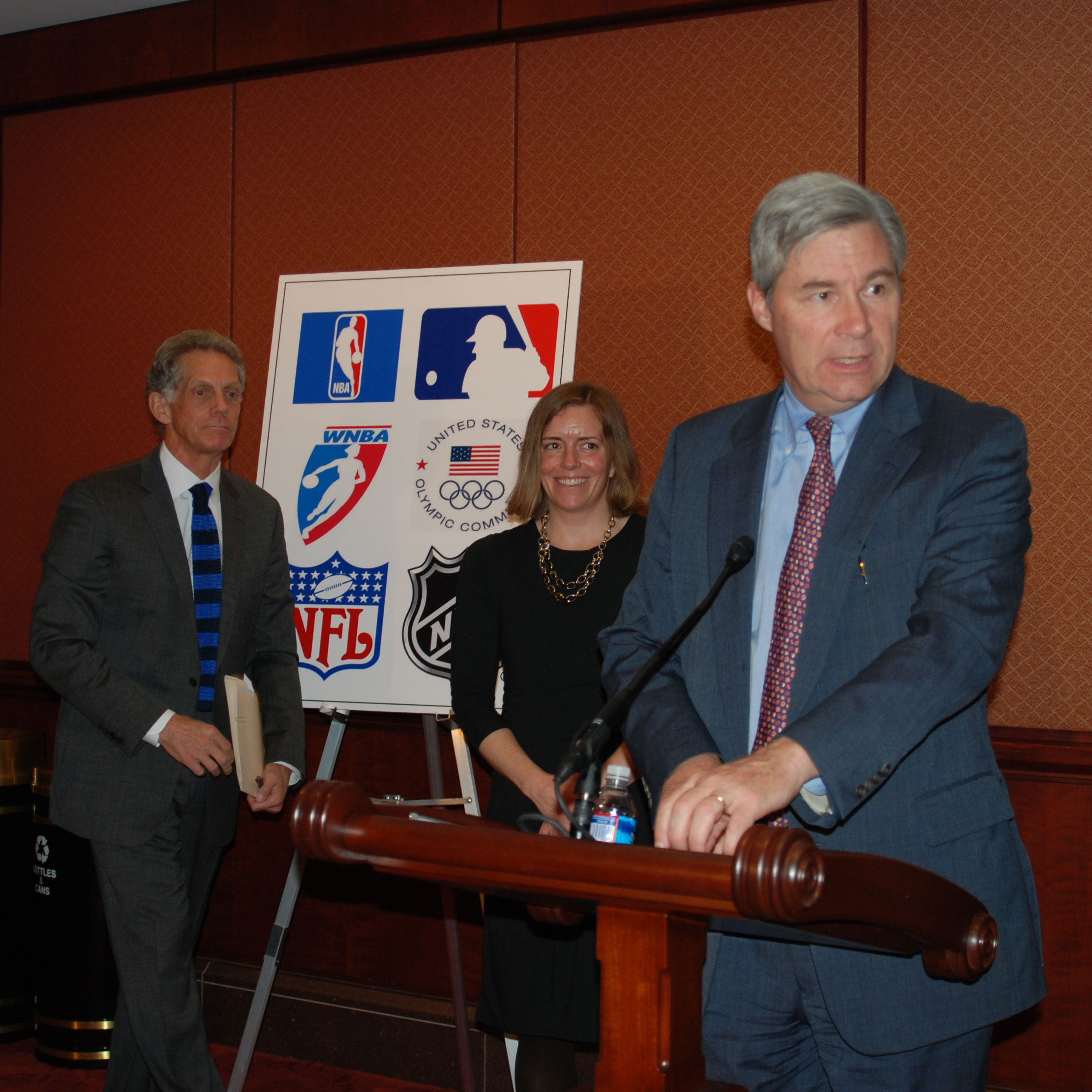 Senator Whitehouse, pictured here with representatives from the MLB and the US Olympic Committee